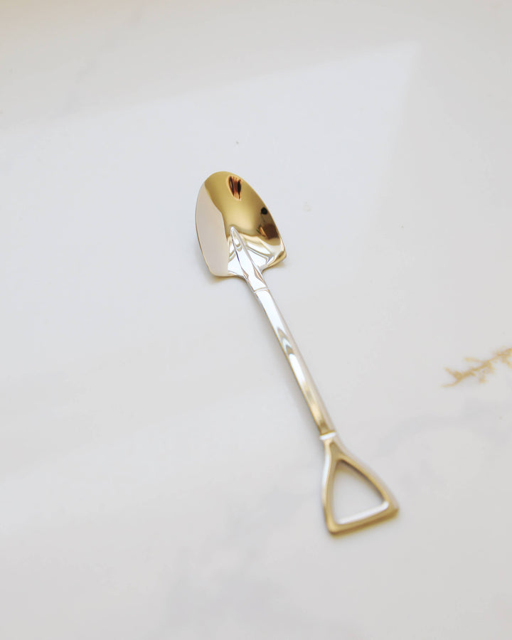 gold shovel spoon
