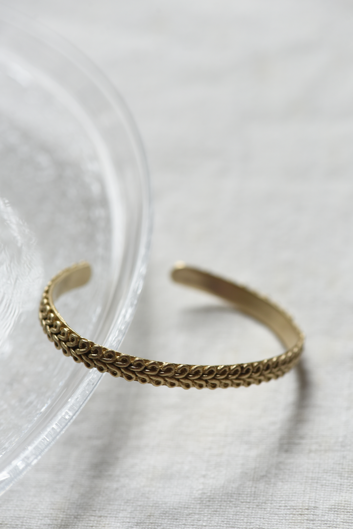 Cuff, brass, braid