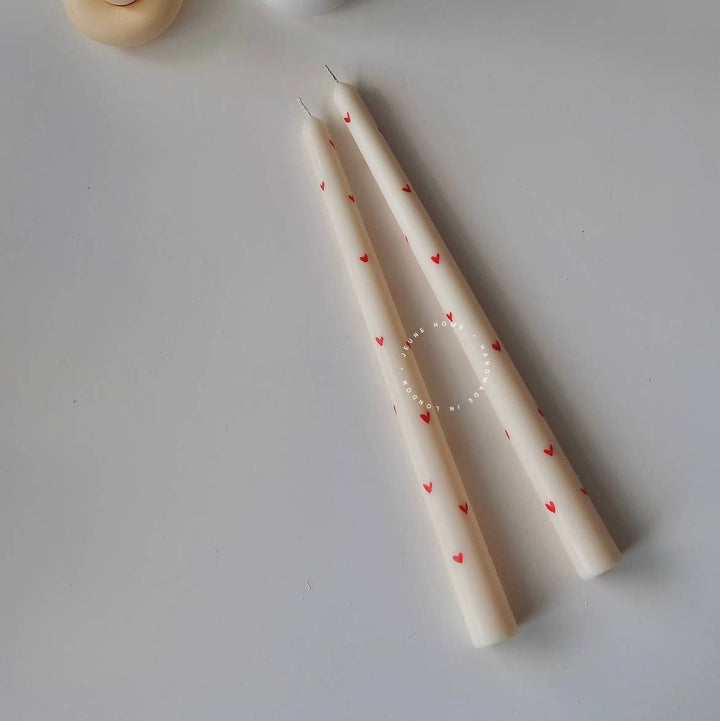 Individual long taper candles with hand painted hearts 